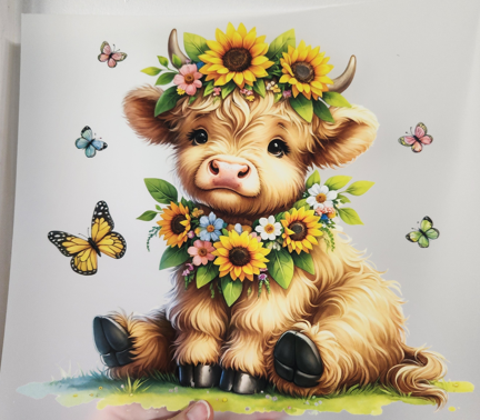 Cow with sunflower